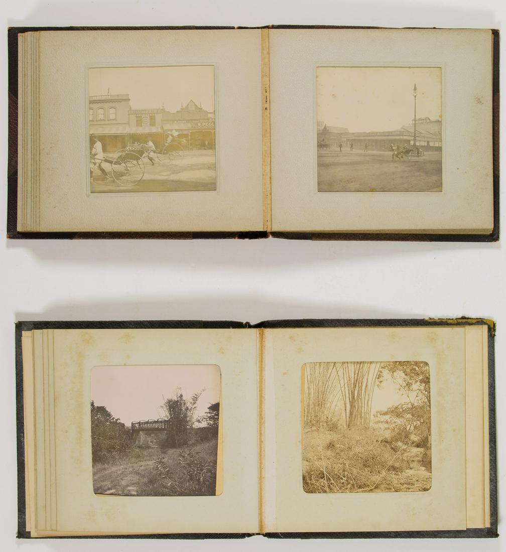 BOER WAR PHOTO ALBUMS: Good pair of Boer War-date photo albums, each approx. 5.75 x 5.25 in., containing a total of 34 original photographs, most 3 in. square (sight), includes: brown cloth photo album containing 22 origina