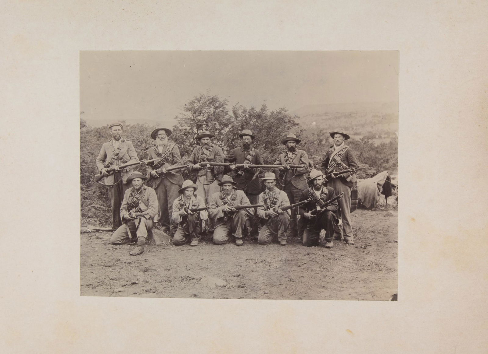 BRITISH CAPTAIN'S PHOTO ALBUM DOCUMENTS THE BOER WAR: Good content British captain's photo album, 12 x 10 in., bearing 32 photographs, each 7.25 x 5.5 in. b/w, related to the Boer War, including images of sprawling British camps, British soldiers marchin