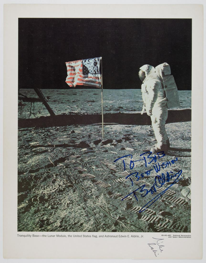 BUZZ ALDRIN AND MICHAEL COLLINS: Superb signed NASA lithograph from the Apollo 11 space mission, 11 x 14 in., showing Buzz Aldrin at Tranquility Base, standing next to the American flag, signed by two members of the mission's crew: B