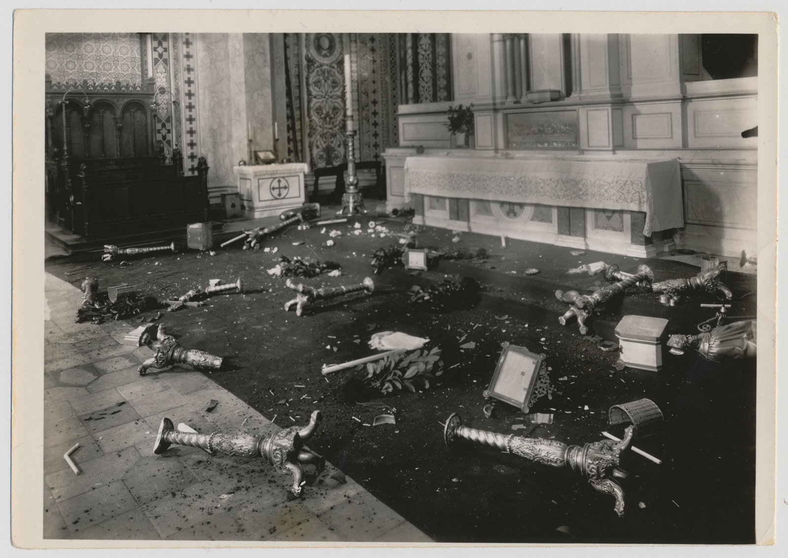 DESTRUCTION OF A SYNAGOGUE: Photograph, 7 x 5 in. b/w, shows the interior of an unidentified desecrated synagogue, likely somewhere in Germany. No printed marking on verso. From the estate of ROBERT G. STEPHENS, JR. (1913-2003).