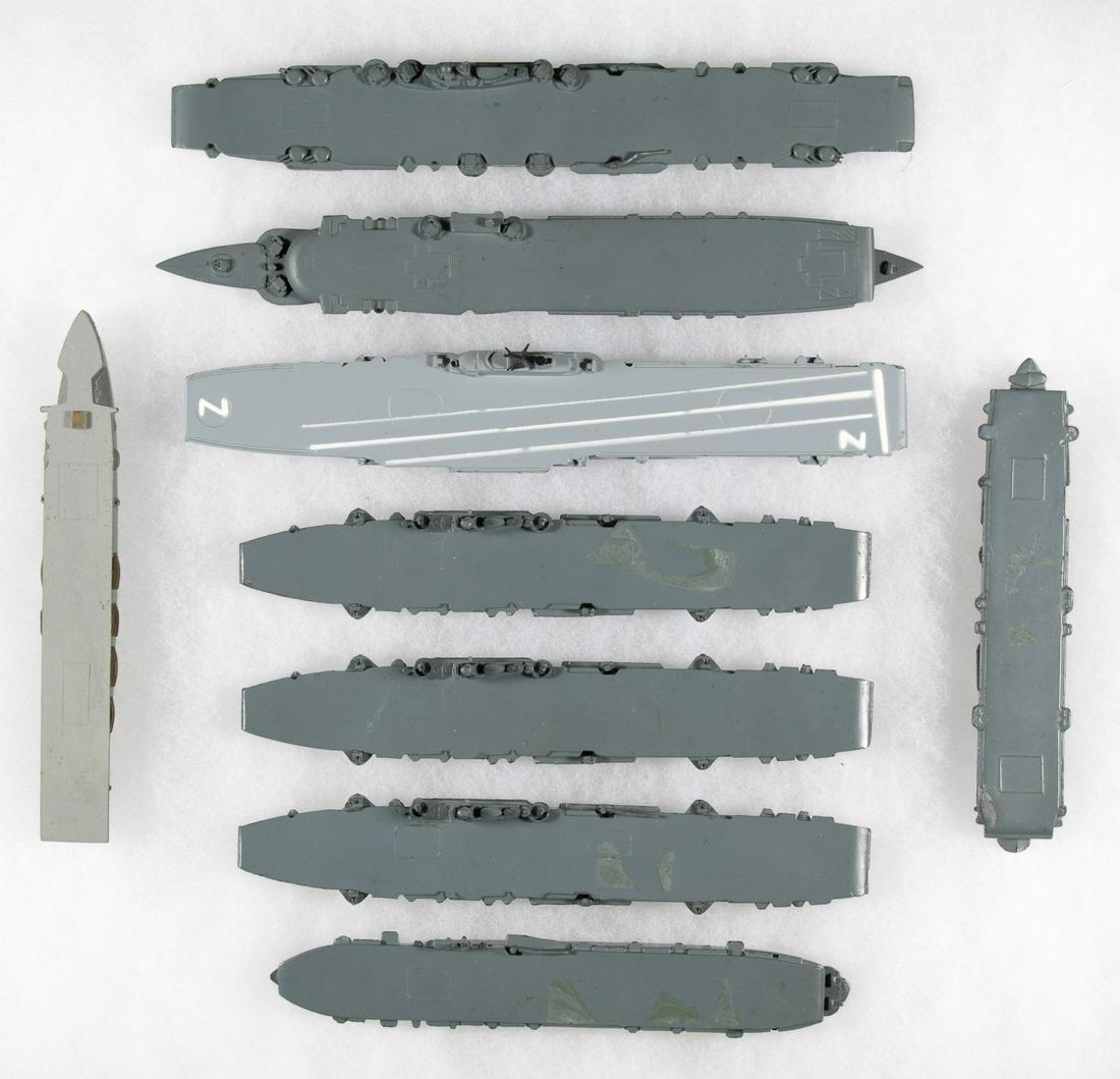 BRITISH AIRCRAFT CARRIER MODELS (9): Lot of nine miniature ship models of World War II-date British aircraft carriers, the longest one measured 7 in. long, includes: three models of 'HMS Unicorn', manufactured by H. A. Framburg; 'HMA Arg