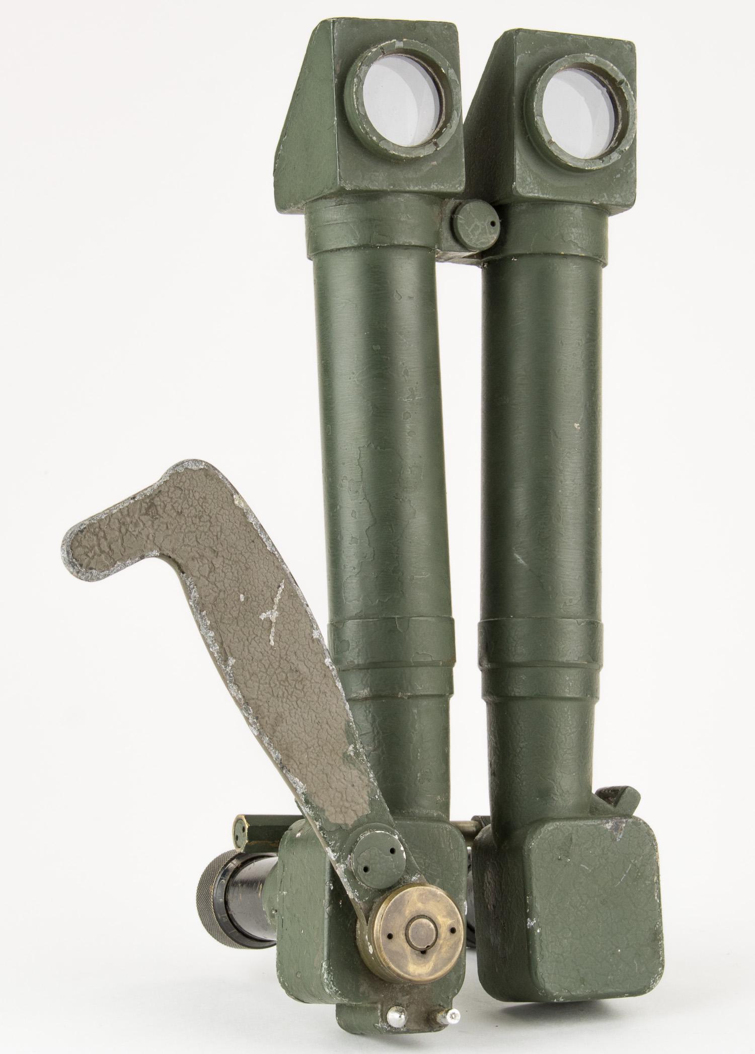 'RABBIT EARS' TRENCH PERISCOPE: A popular style metal periscope used by both sides in World Wars One and Two, 10.5 x 4.5 in. (wide), impressed with the lens dimensions and an unknown manufacturer's information. The scope was used pr