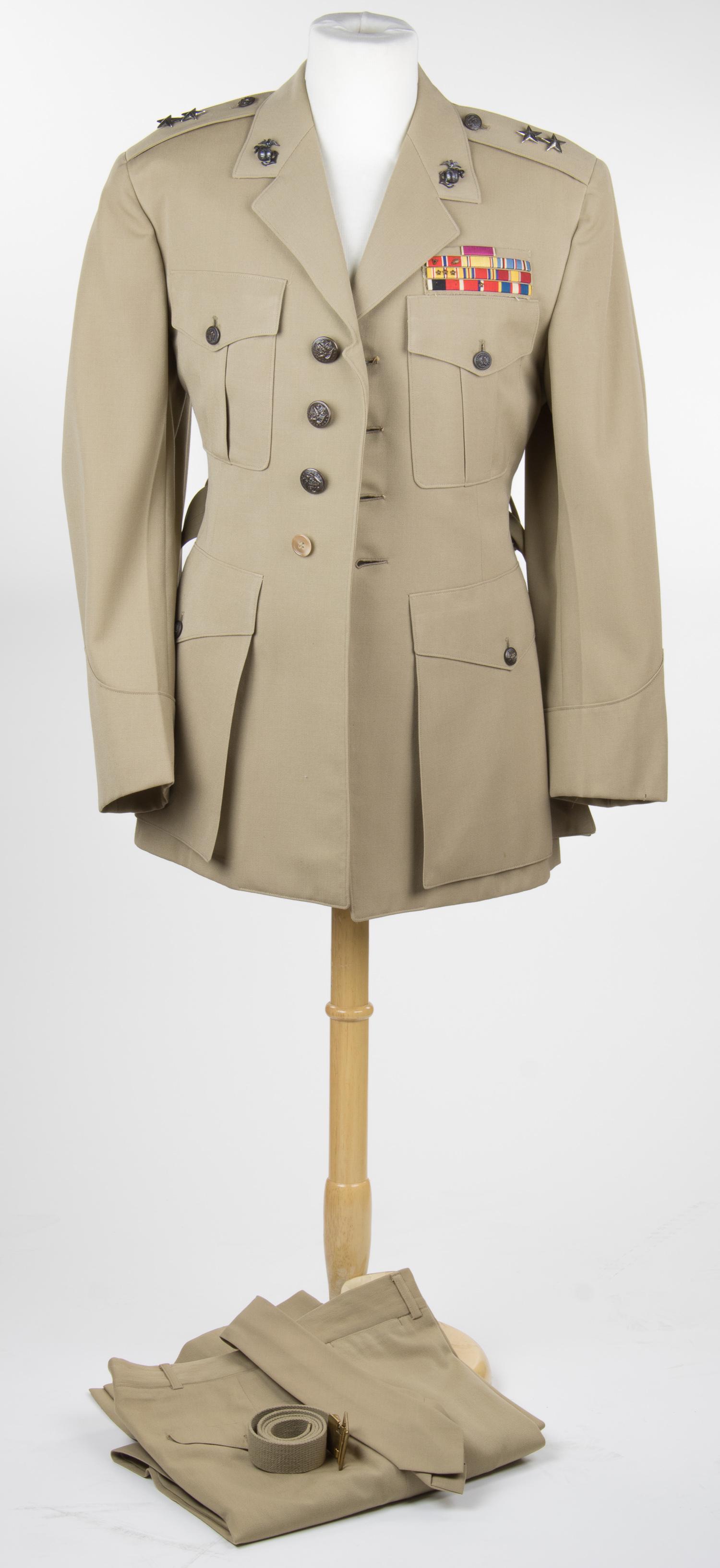 USMC MAJOR GENERAL GEORGE E. TOMLINSON'S UNIFORM: GEORGE E. TOMLINSON (1906-1986) Major General, Engineers, USMC. As a colonel during World War II, he saw much combat in the New Georgia and Bougainville campaigns as 'Engineer Officer, Service Command