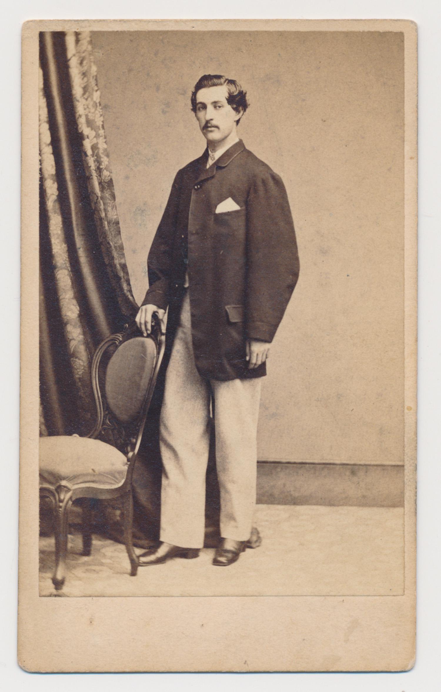 UNION SOLDIER PHOTOGRAPH: UNION SOLDIER PHOTOGRAPH Original Civil War carte de viste photo of Corp. Gideon Ryder, 2.5 x 4 in. b/w, a full standing portrait in civilian attire, signed and inscribed on the verso: 'Gideon A. Ryde