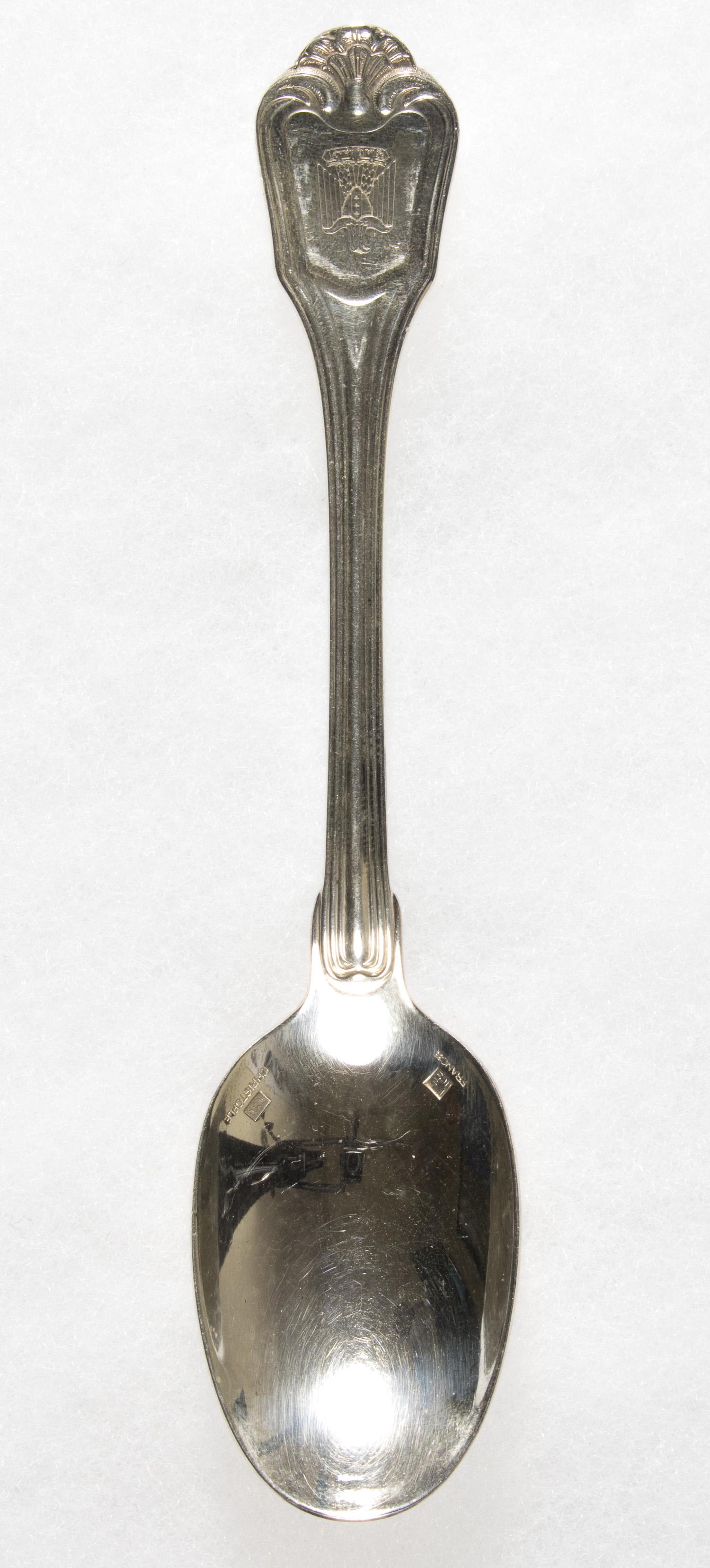 SADDAM HUSSEIN SPOON: A fine piece of silverware once belonging to Iraqi dictator Saddam Hussein (1937 - 2006) and taken by a soldier from one of his palaces. The 5.5 in. sterling silver spoon bears the Iraqi national eagl