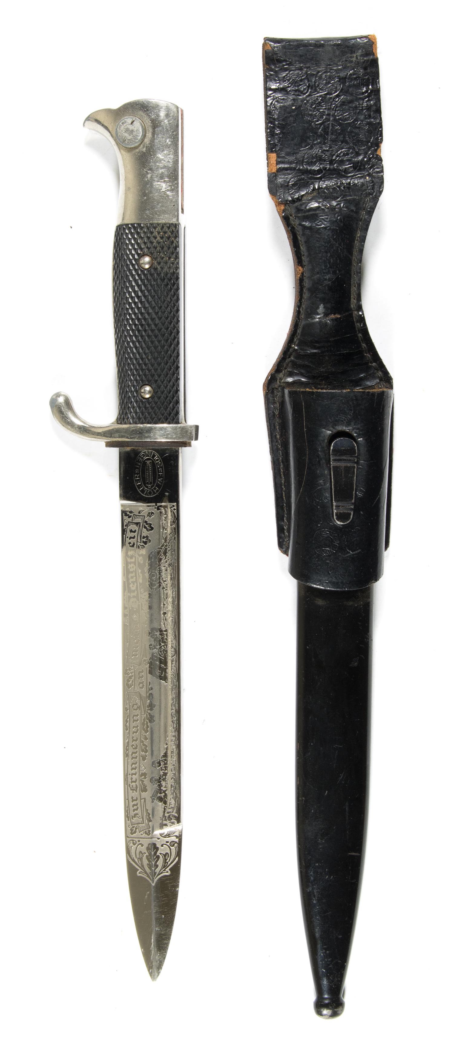 ENGRAVED DRESS BAYONET OF GERMAN ARTILLERY REGIMENT: A truly ornate dress bayonet presented to a veteran of a German artillery regiment, 7.75 in. blade, 12.5 in. overall. The obverse of the blade bears the regiment's name 'Art. Reg. 46...Amberg/Bayer. O