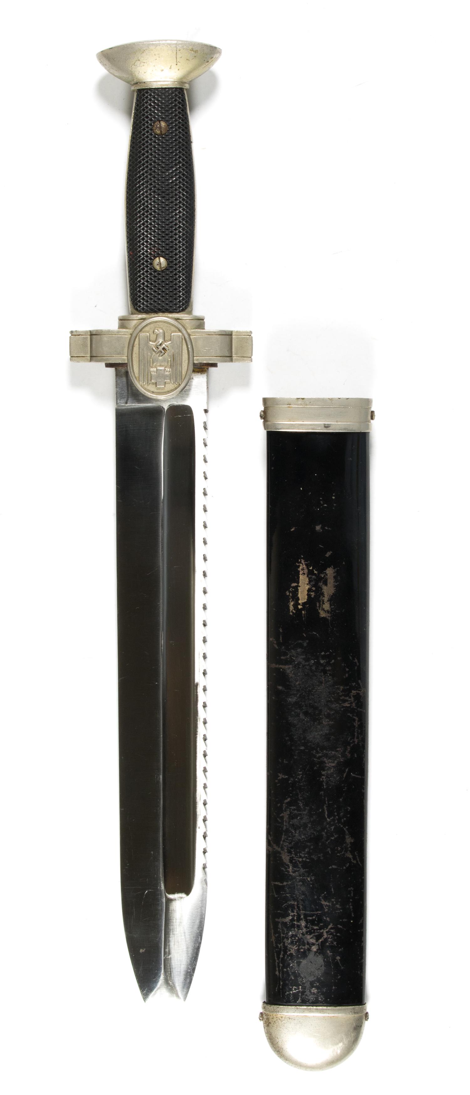 UNIT-ETCHED GERMAN RED CROSS HEWER: Scarce German Red Cross hewer with scabbard, engraved on the crossguard with the unit number of its owner. The piece, 10.5 in. blade, 15.75 in. overall, bears black bakelite grips with the front side 