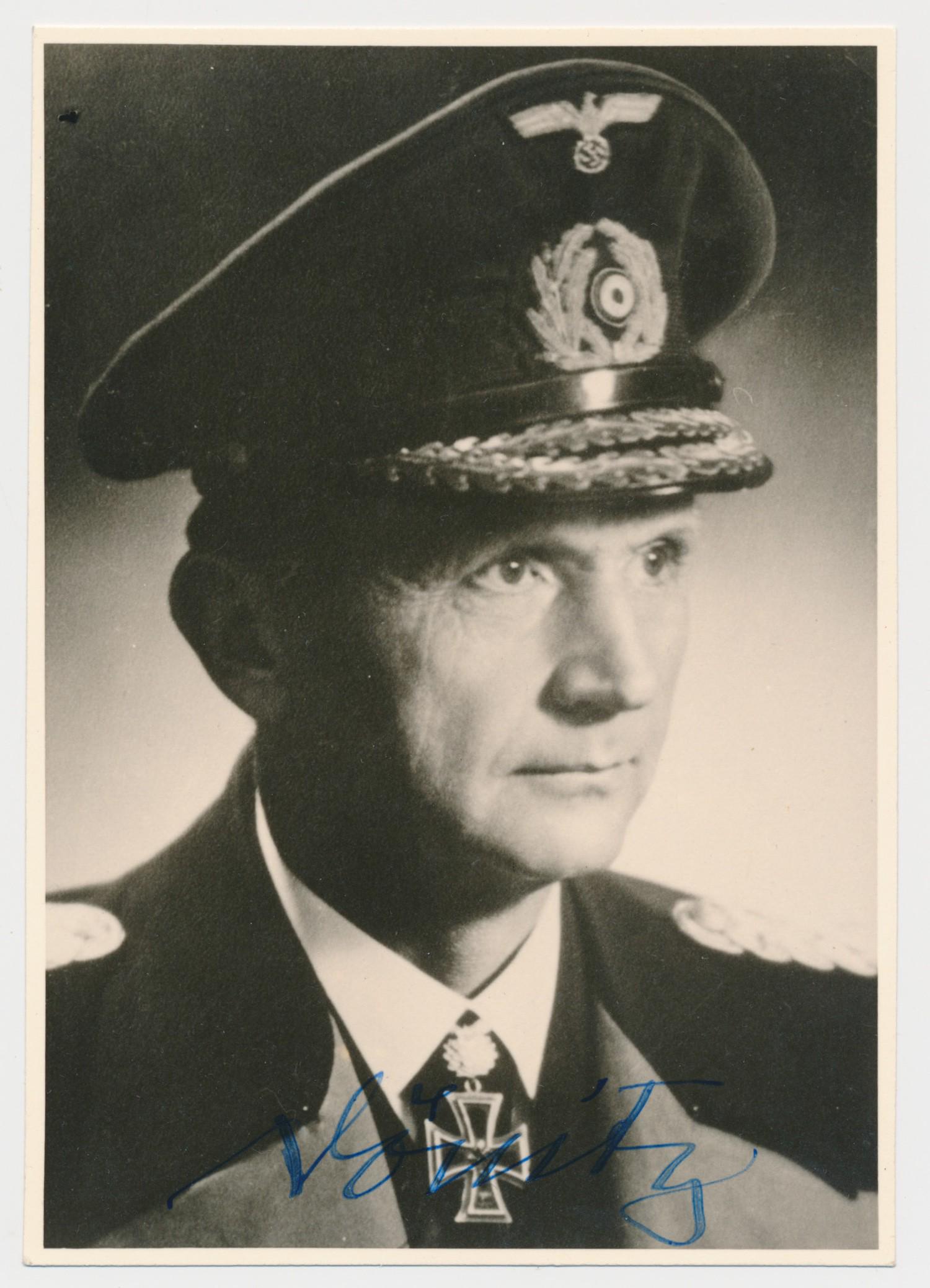 KARL DONITZ: (1891 - 1980) German admiral who headed the U-Boat arm of the German Navy, later succeeded Hitler as Fuhrer after Hitler's suicide. S.P., 4 x 5.75 in. b/w, a chest, up pose in uniform signed at bottom