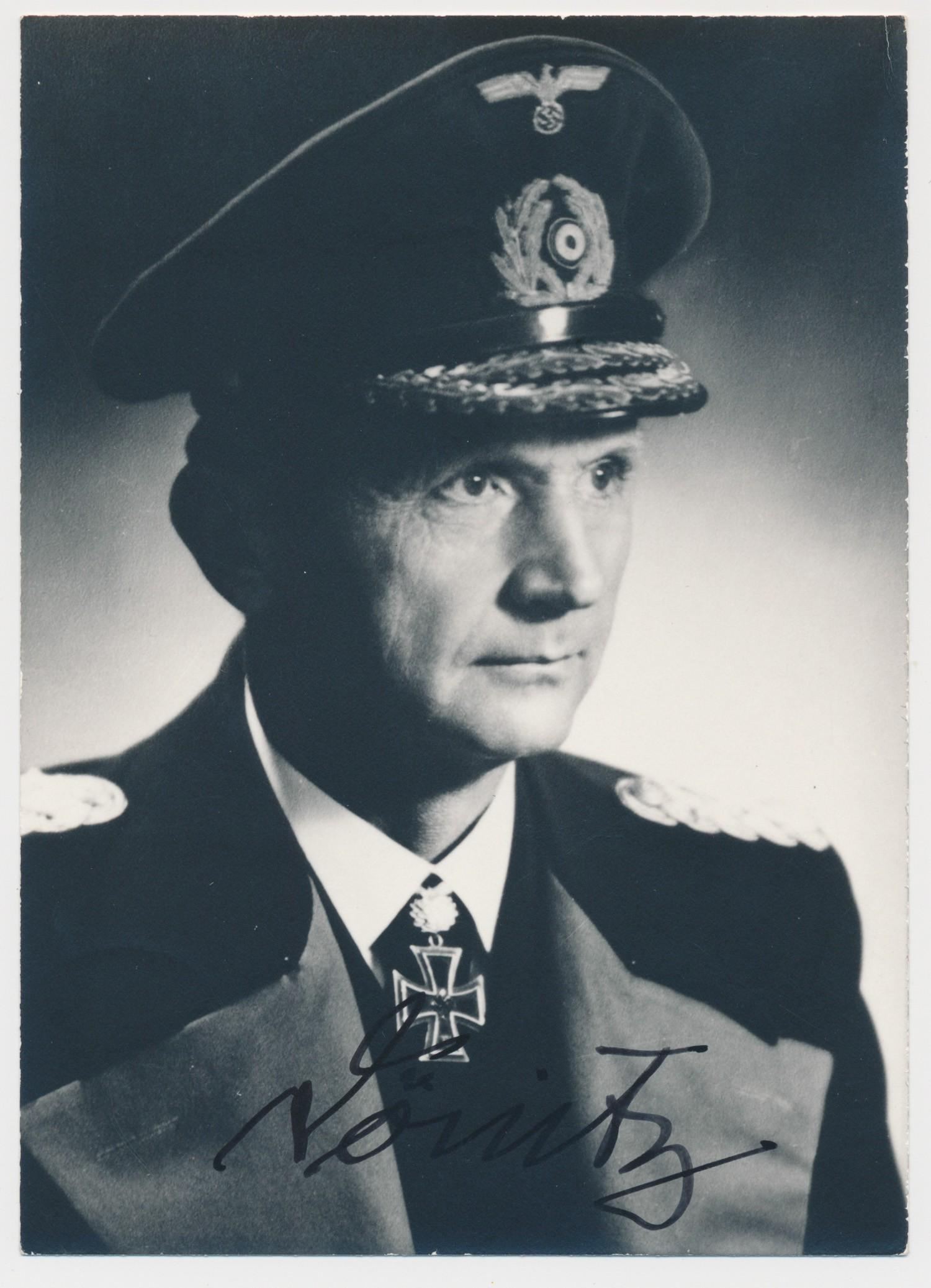 KARL DONITZ: (1891 - 1980) German admiral who headed the U-Boat arm of the German Navy, later succeeded Hitler as Fuhrer after Hitler's suicide. S.P., 4 x 6 in. b/w, a portrait in uniform signe din black ink at bo
