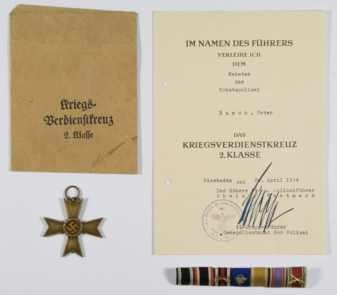 (JURGEN STROOP) DOCUMENT GROUPING TO MEISTER DER: An excellent document and medal grouping from the service of Meister der Schutzpolizei Peter Busch, including an excessively rare award document signed by JURGEN STROOP (1895-1952), SS and Police Lead