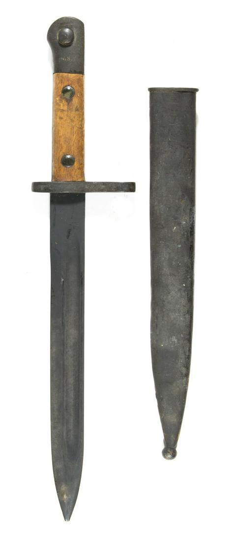 TURKISH STYLE MAUSER BAYONET: Bayonet for a Turkish style Mauser rifle, 9.5 in. blade, 14.5 in. overall, wood grip secured by two screws, serial no. 3279, blade painted black obscuring any other marks. Accompanied by the original 