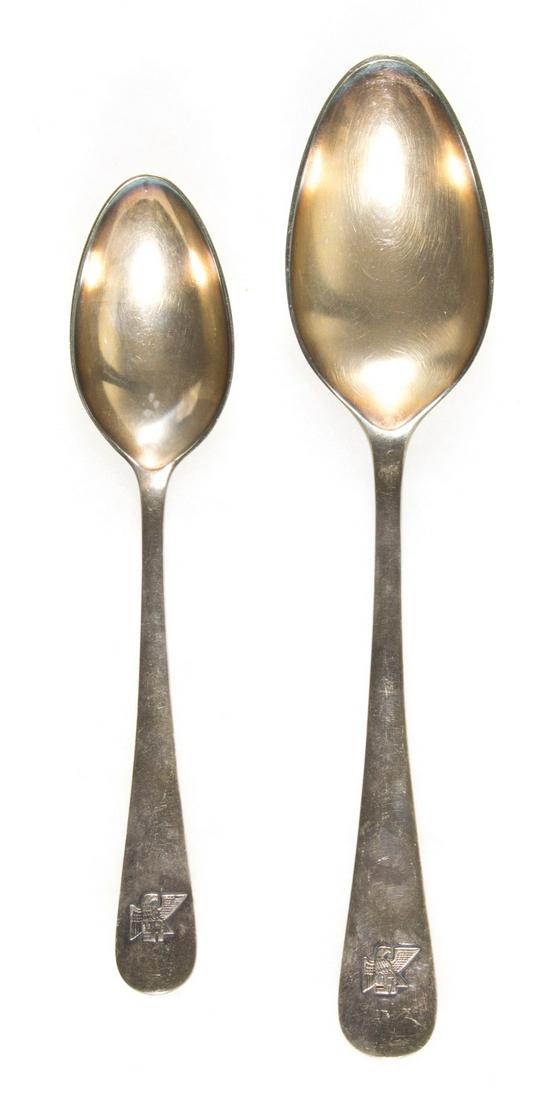 FRITZ SAUCKEL PERSONAL SILVERWARE: Two silver-plated serving pieces of tableware once owned by the Gauleiter of Thuringia, Fritz Sauckel, varying sizes, both serving spoons being 8.5 and 10.25 in. long respectively. Each piece bears a 