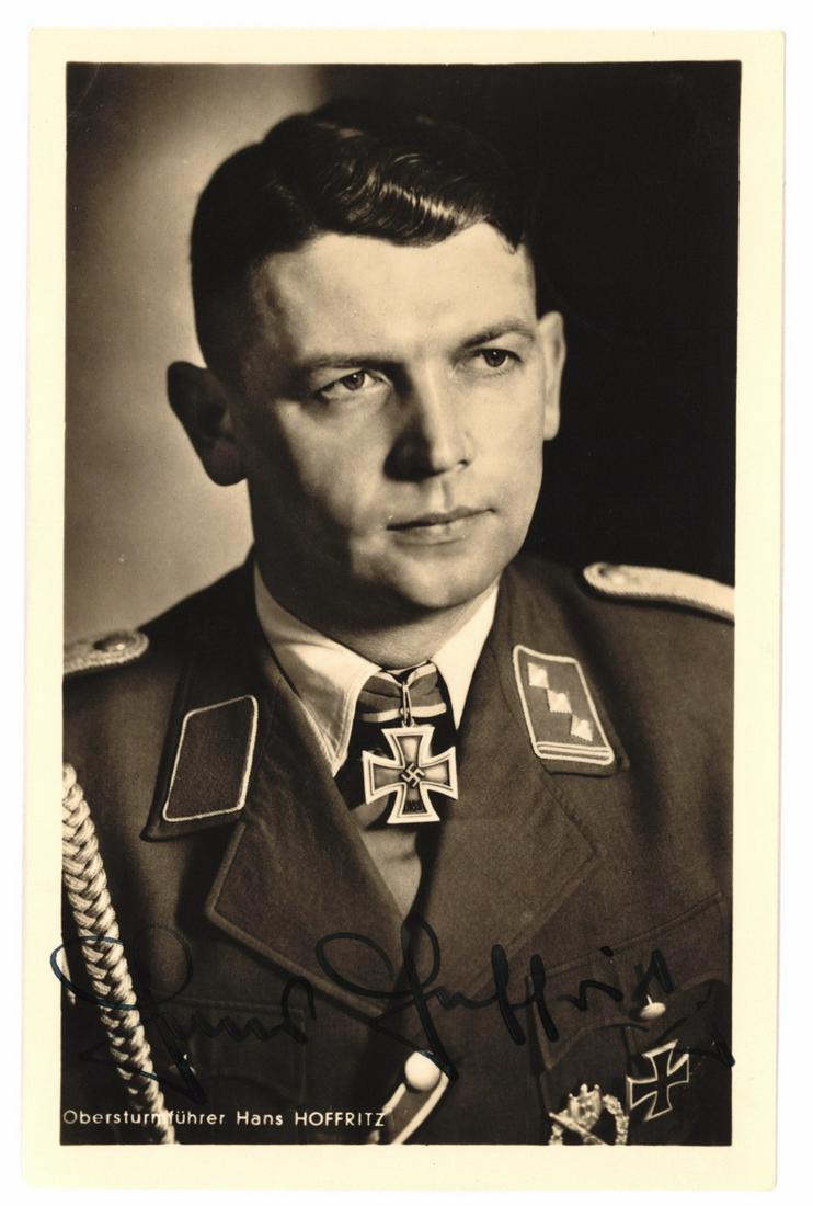 HANS HOFFRITZ: (1914 - 1971) German captain in the Waffen-SS, a Knights Cross recipient. Probable war-date signed postcard photo by Hoffmann, 3 1/2 x 5 1/2 in. b/w, a chest-up pose in uniform boldly signed at bottom