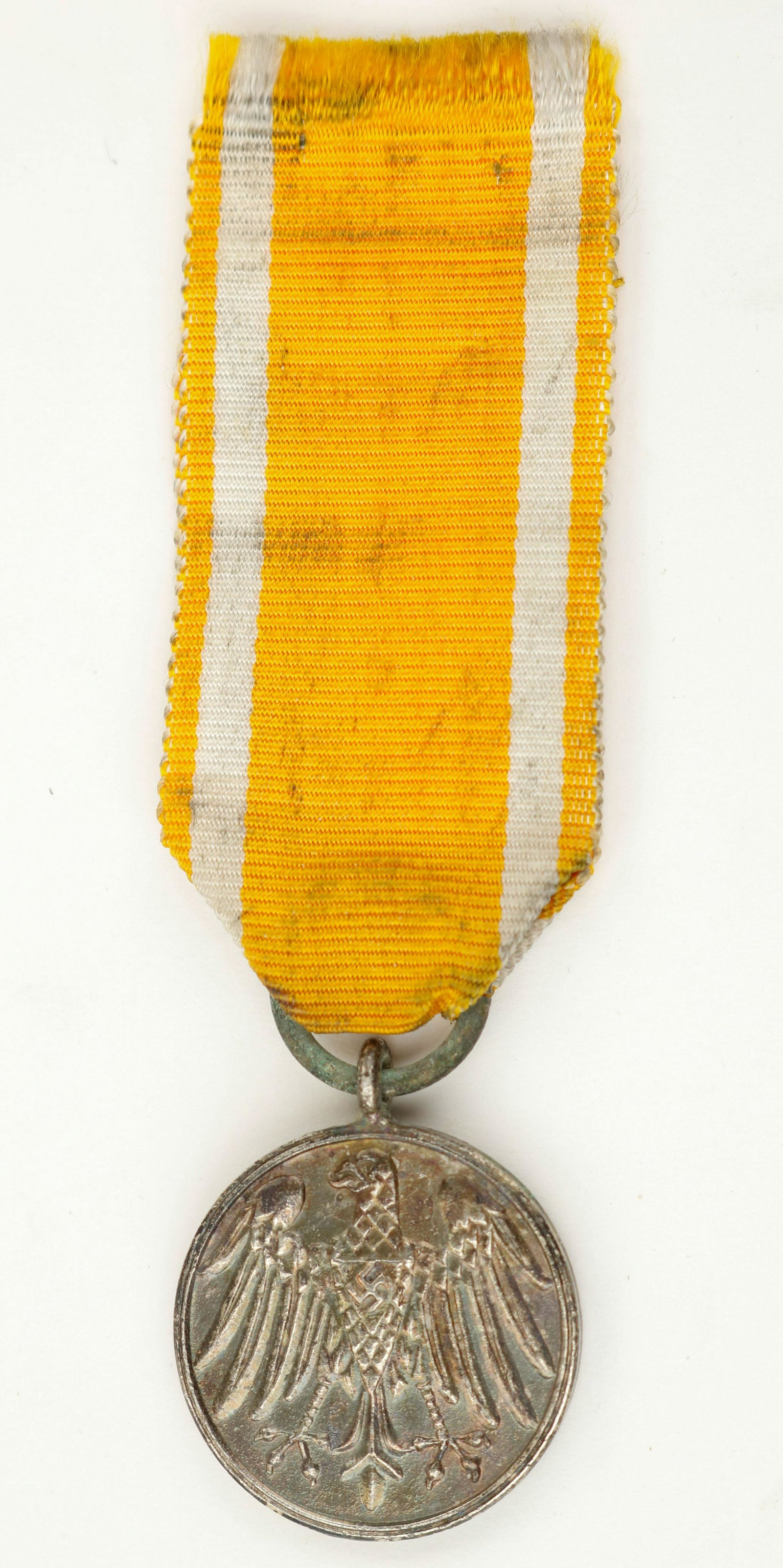 THIRD REICH LIFESAVING MEDAL: German Commemorative Medal for Rescue from Danger. The obverse of the medal features a central Prussian eagle with a swastika upon its chest, the reverse features the inscription 'FUR RETTUNG AUS GEFA
