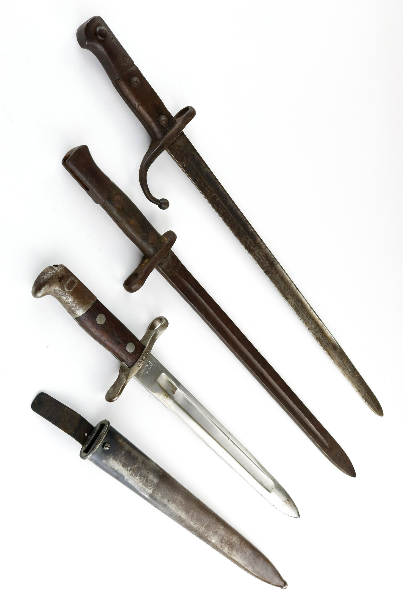 LOT OF THREE LONG BAYONETS (3): Lot of three longer bayonets, various types including a examples from Switzerland and Turkey. Fair to good condition, sold as-is.