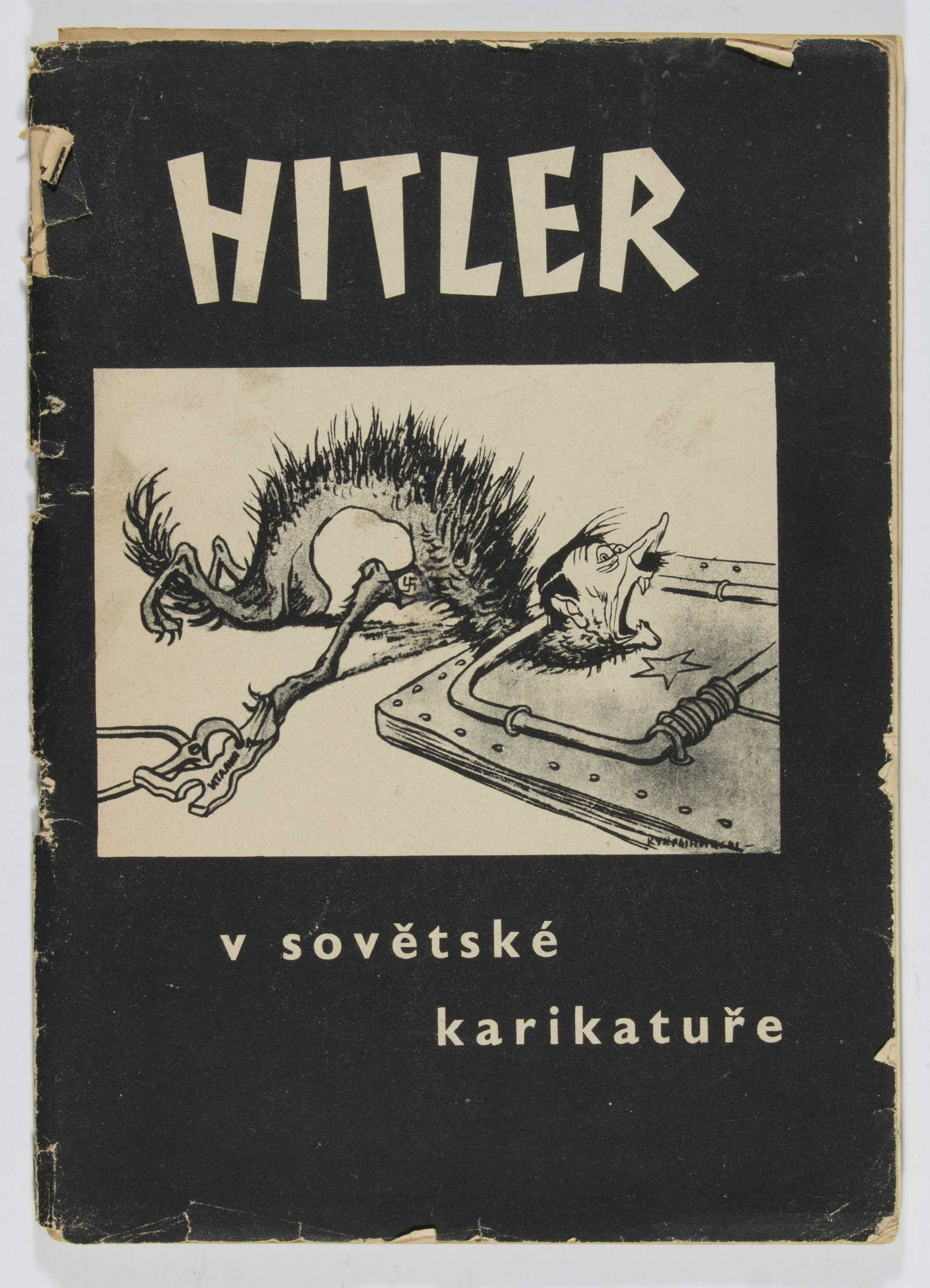 HITLER IN SOVIET CARICATURES: Soviet cartoon book, 7.75 x 11 in., issued by the Society for Cultural and Economic Relations with the USSR in Prague, 1945, featuring Hitler in 28 b/w caricatures accompanied by half page writings in