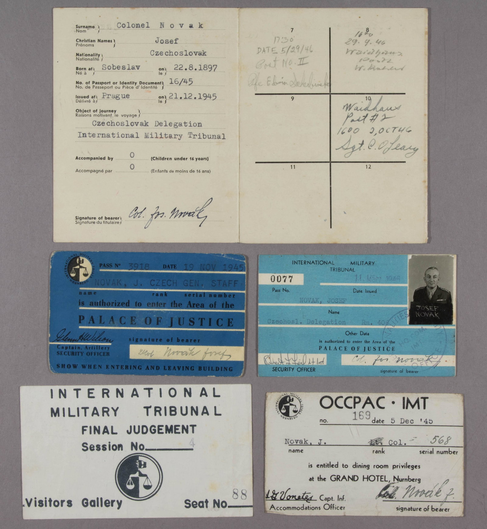NUREMBERG TRIALS PASSES: Pair of admittance passes to the Palace of Justice in Nuremberg for the trials of the chief Nazi war crimes defendants. Both 4 x 2.5 in. passes belonged to Czech Col. Josef Novak and bear his signatur