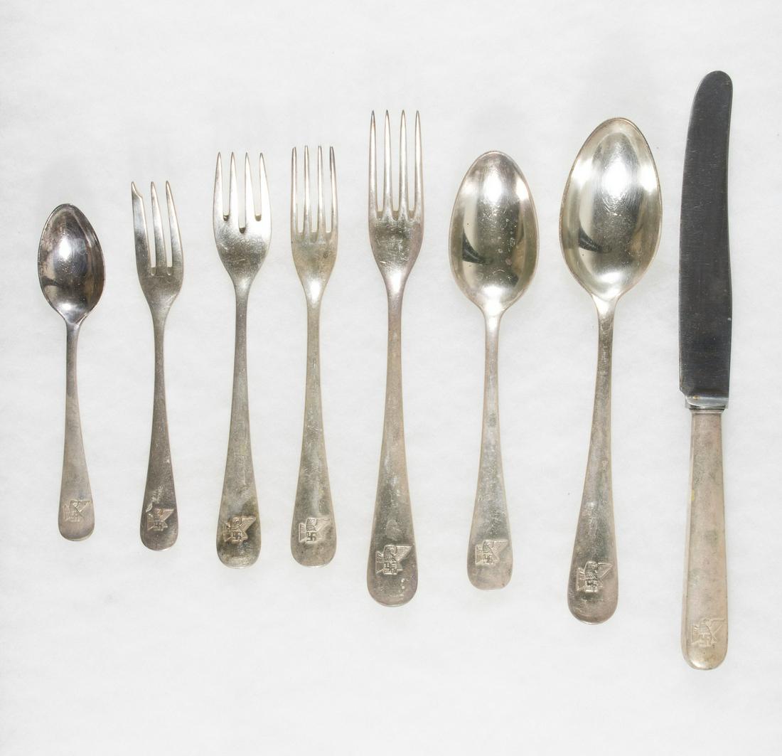 FRITZ SAUCKEL CUTLERY SET: A rare set of silver-plated cutlery once owned by the Gauleiter of Thuringia, Fritz Sauckel, varying sizes, comprised a knife, four forks, and three spoons. Each piece bears a 'Thuringia eagle' in rel