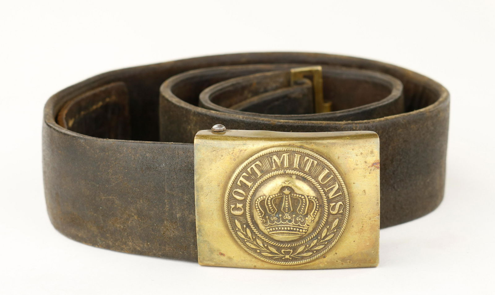 GERMAN ARMY BELT: World War I German army belt, leather approx. 36 in. long, 1 5/8 in. wide, brass 'Gott Mit Uns' buckle sindented at the center.
