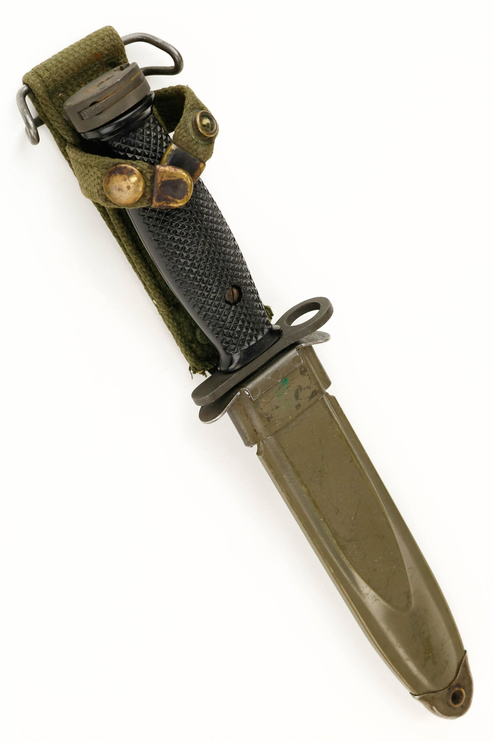 M1 CARBINE BAYONET WITH SCABBARD: M1 rifle bayonet, 11.25 in. long overall, checkered grip with Parkerized 6.25 in. blade, the top of the blade marked: 'U.S. M3 IMPERIAL' In fine condition, blade near mint. With composite scabbard wit