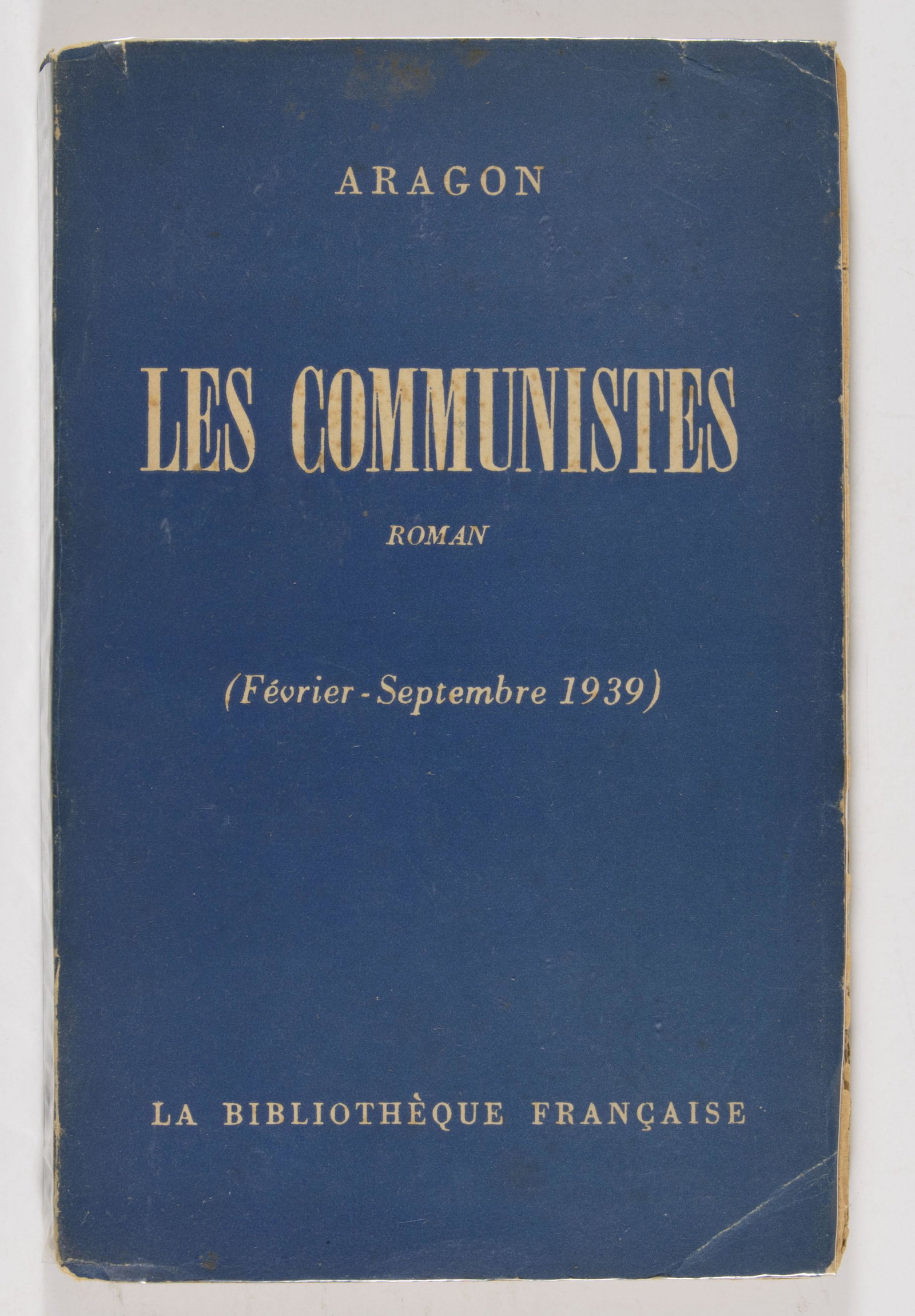 LOUIS ARAGON: (1897 - 1982) French poet, novelist, editor, and member of the Communist Party. His signed book 'Les Communistes' (Paris: J. London Printer), 1949. 265 pp. 8vo. The blue cover of the book is almost fu