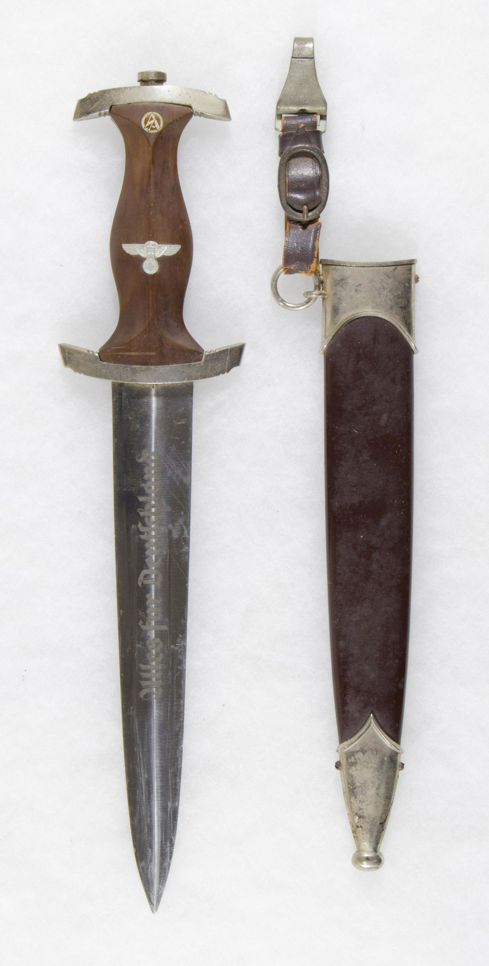 RZM-PERIOD WKC S.A. DAGGER: RZM period WKC SA Dagger. A nice example with nickle-plated fittings, and undamaged pommel nut, cross guards bearing slight surface corrosion, and with a more serious spot of rust on the reverse of th
