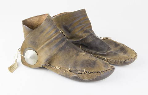 LEATHER MOCCASINS ATTRIBUTED TO CARL MOON AND GERONIMO: A most unusual and provocative relic, a pair of leather moccasins said to have been owned and worn by GERONIMO (1829-1909), one of the most prominent Apache leaders and medicine men. Geronimo's raids