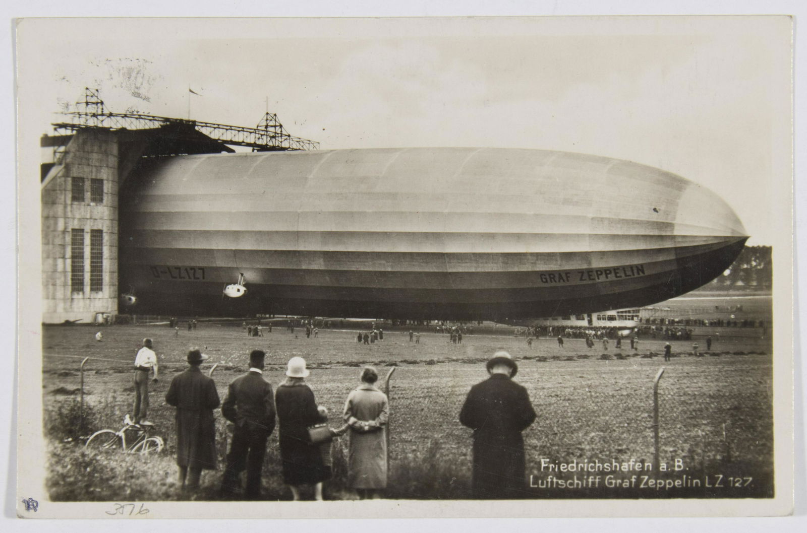 AIRSHIP ‘GRAF ZEPPELIN’ POSTCARD 1929: Sieger 25B Real-photo postcard showing the airship ‘Graf Zeppelin’ at Friedrichshafen, cancelled St. Polten, May 2, 1929. Very good condition.