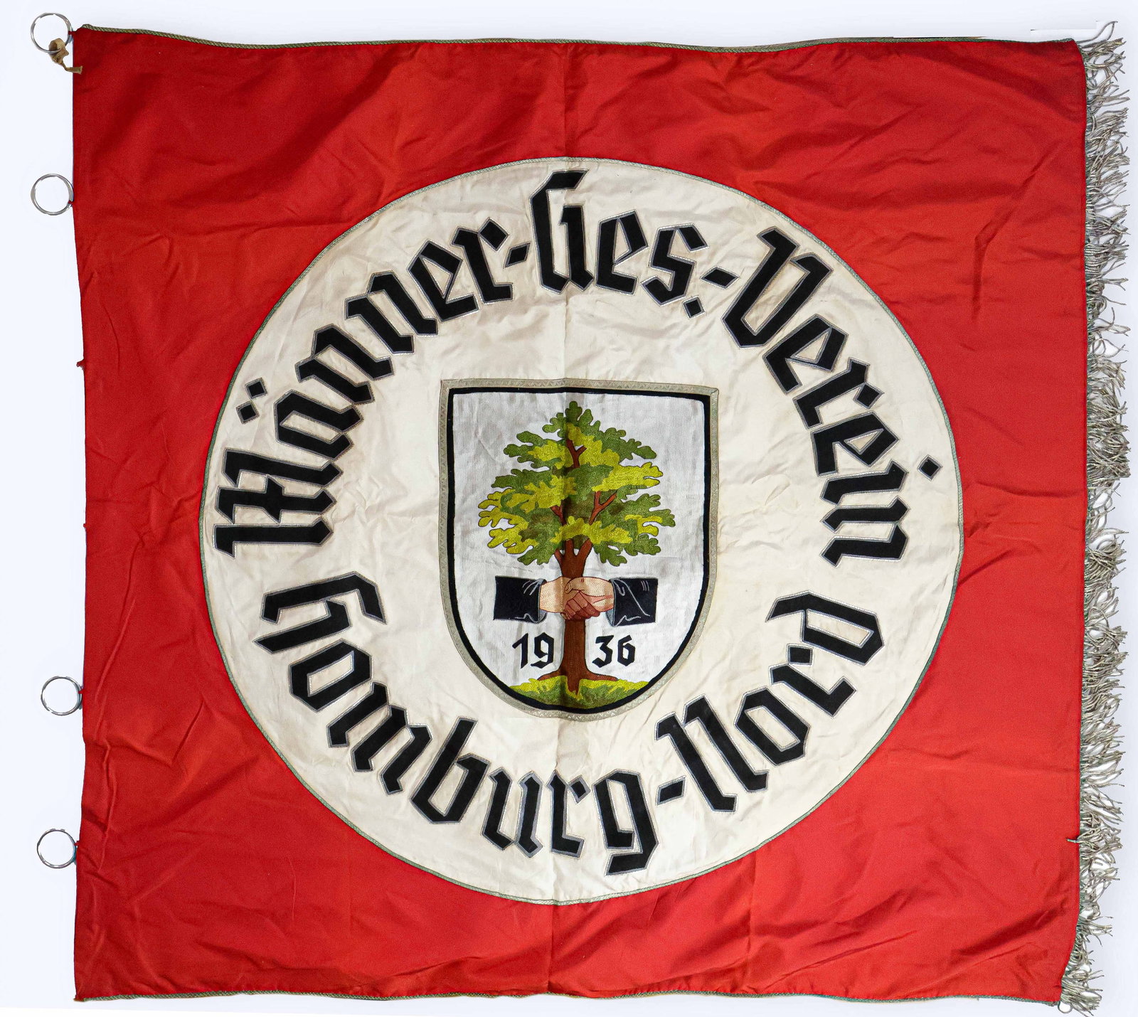GERMAN SINGING CLUB POLITICAL BANNER: An exceptional flag, 44 in. square rayon, depicting a central design on a sewn white field, all on a red background. One side shows a Grecian harp with a sword superimposed over it surmounted by a red