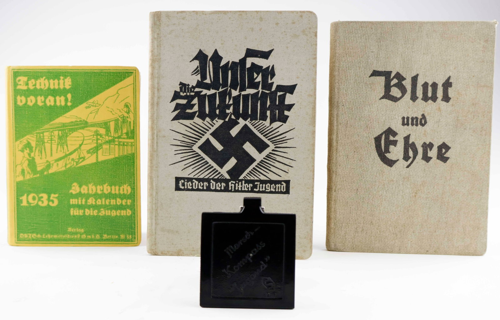 HITLER YOUTH BOOKS (3): Lot of three books related to the Hitler Youth. Includes: ‘Technik voran! Jahrbuch mit kalender fur die jugend 1935’ (‘Technology ahead! Yearbook with calendar for the youth 1935R