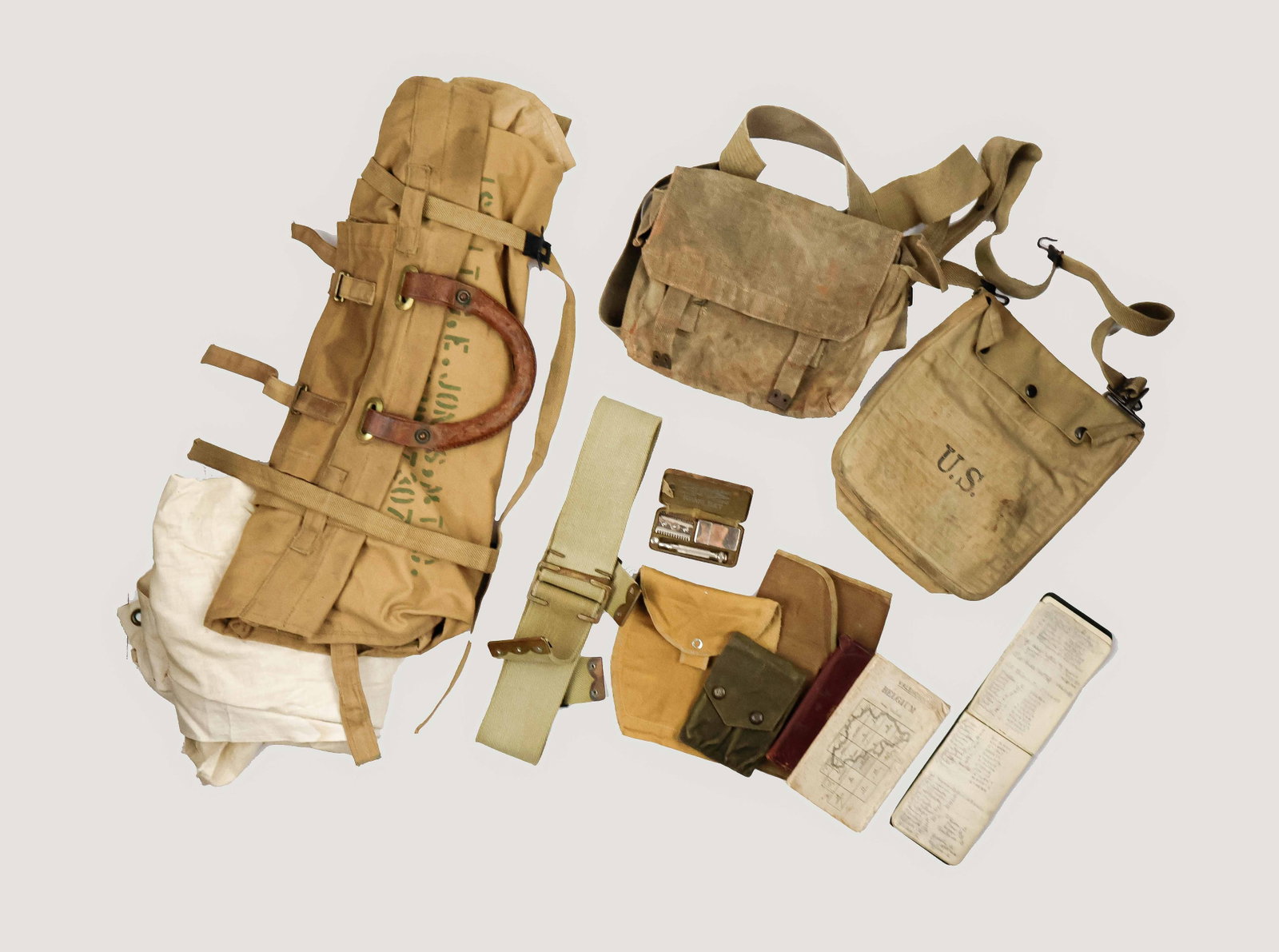 WORLD WAR I FIELD GEAR GROUPING (11): Balanced collection of eleven field gear items from World War I, both British and American. Includes: U.S. Army gillette shaving kit, complete with handle, blade holder, and razor case (lacking razor)