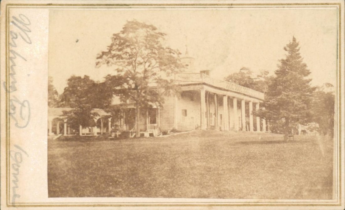 PHOTOGRAPH OF GEORGE WASHINGTON’S MT. VERNON HOME: An original, Civil War era photograph, 4 x 2.5 in. sepia, depicting the exterior of George Washington’s home at Mt. Vernon. The verso indicates this photo was taken and published by Bell and Bro