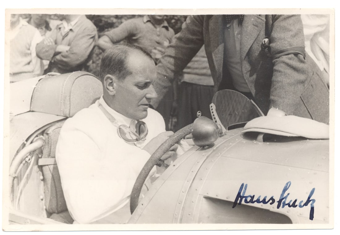 HANS STUCK: (1900-1978) German racecar driver known as ‘King of the Mountains’ and a personal friend of Adolf Hitler since 1925. S.P., 5 x 3.5 in. b/w, depicting Stuck in his race car, signed at the b