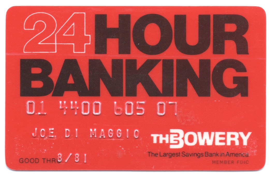 JOE DIMAGGIO’S ORIGINAL CREDIT CARD: A fine personally-owned relic from ‘Joltin’ Joe’, his credit card from The Bowery Savings Bank, red plastic with the expiration date of 8/[19]81. Not signed. Purchased by our consign