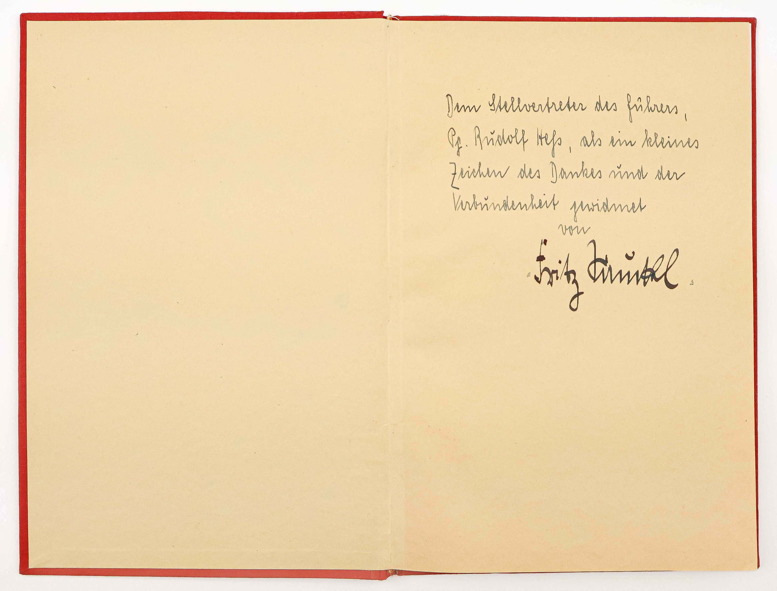 FRITZ SAUCKEL INSCRIBES A BOOK TO RUDOLF HESS: (1894 - 1946) Nazi chief of slave labor recruitment who seized over five million workers and kept them under the vilest condition. Tried, convicted and hanged at Nuremberg. Signed book: ‘The 300