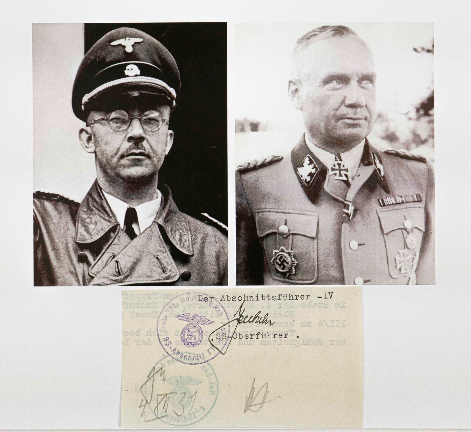 HEINRICH HIMMLER AND FRIEDRICH JECKELN: Pair of signatures on a 4.25 x 2.5 in. slip cut from a document, includes pencil initials 'H H' of HEINRICH HIMMLER (1900-1945), Hitler's Chief of the Gestapo placed in charge of security and responsi
