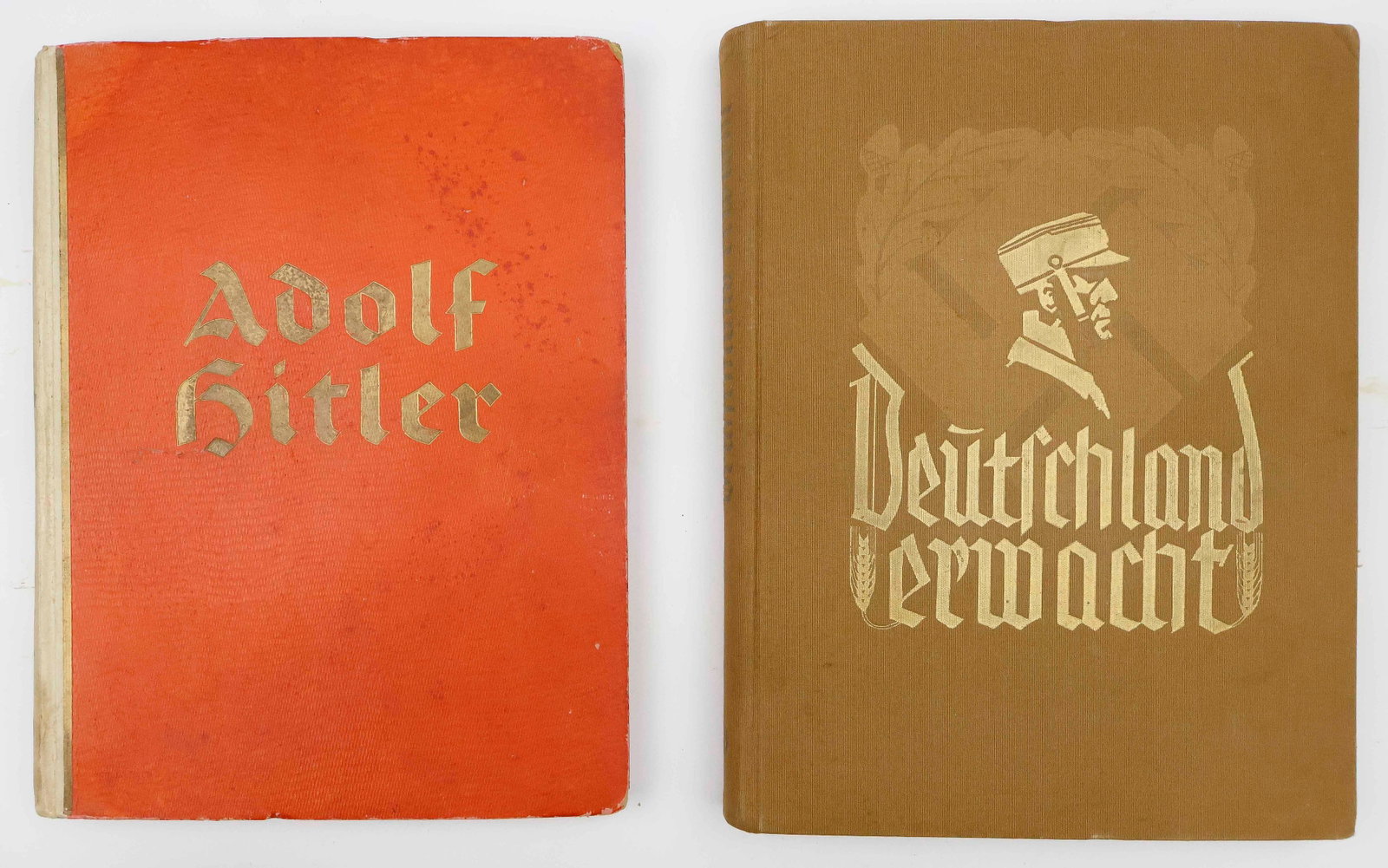 GERMAN CIGARETTE ALBUMS (2): Lot of two German ‘cigarette’ albums, including: ‘Adolf Hitler Pictures From the Life of the Fuhrer’ (Bilderdienst: Hamburg: Herausgegeben vom Cigaretten), 1936. 133pp. large 4