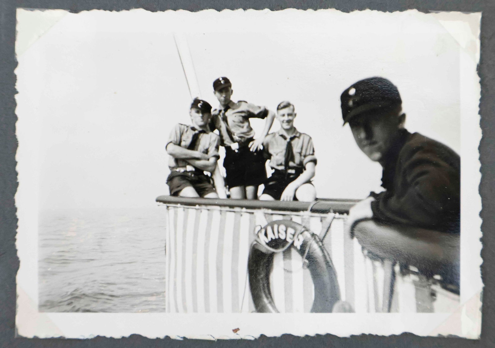 HITLER YOUTH PHOTOGRAPH ALBUM: Superb Hitler Youth photograph album containing approx. 190 images of three brothers, at least two of whom are shown from the time were in the Hitler Youth, through their training and into their respe