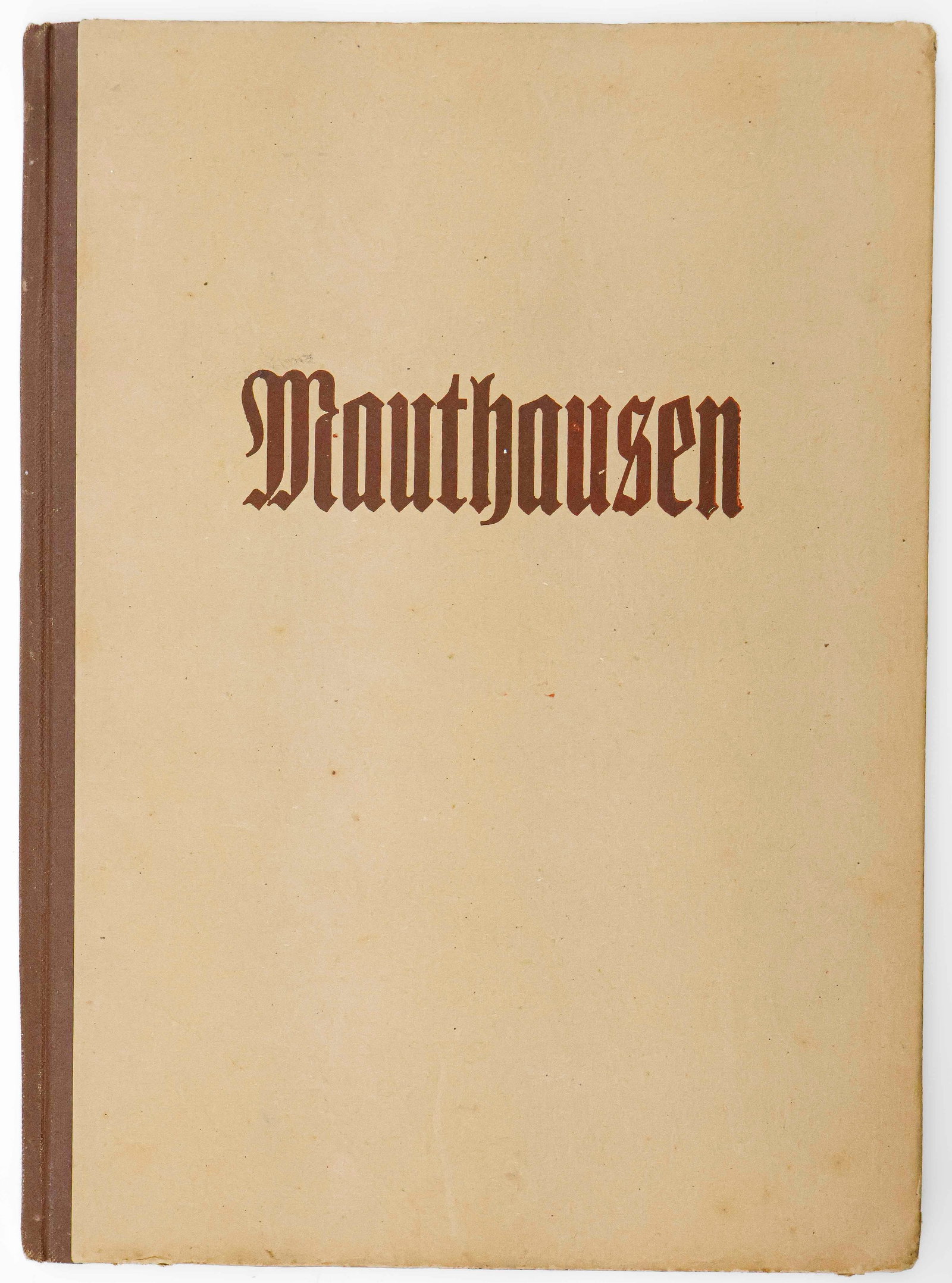 ‘MAUTHAUSEN’: Czech publication: ‘Mauthausen’ (Prague: KSC Kraj Praha), no year. 58pp. 4to., brown boards. The book is filled with images of the concentration camp Mauthausen located in Austria. Images 