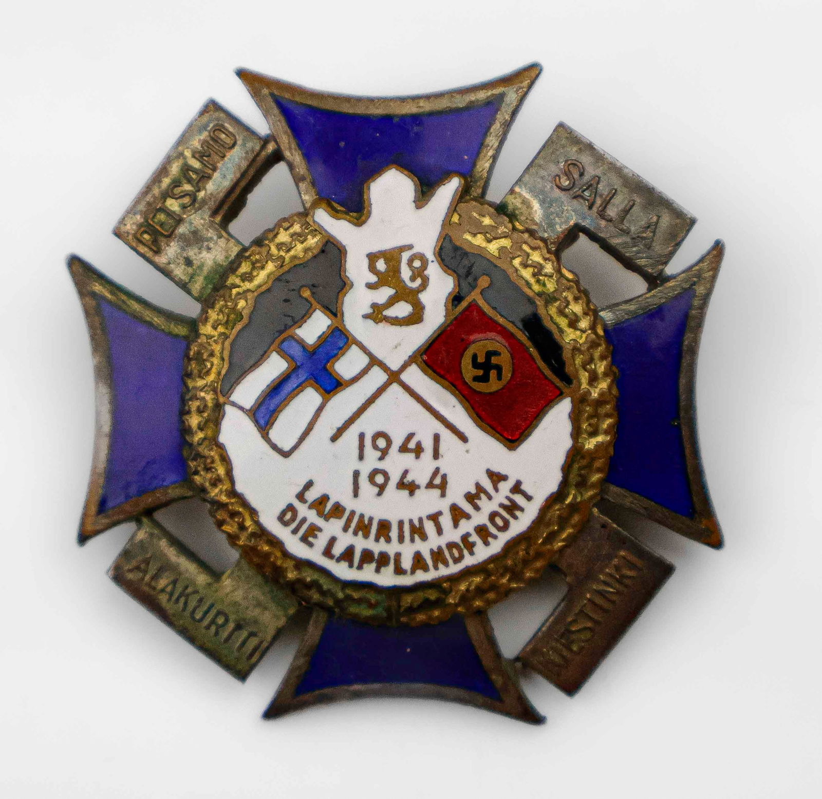 FINNISH-GERMAN NORTHERN FRONT CROSS: Finnish-German ‘Pohjoisrintama’ Northern Front Cross 1041/44. Constructed of enameled tombac, 2.5 in. square, displaying the flags of Germany and Finland along with the Finnish coat of arm