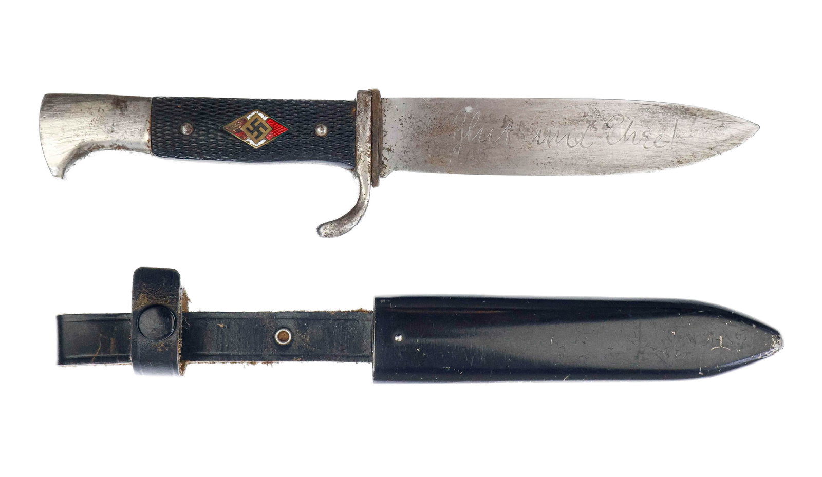 HITLER YOUTH KNIFE: A good, early example of a Hitler Youth knife, 5.5 in. blade etched ‘Blut und Ehre!’, checkered black grip with inset enameled Hitler Youth emblem, blade marked ‘Carl Eickhorn Solingen Ges. Gesc