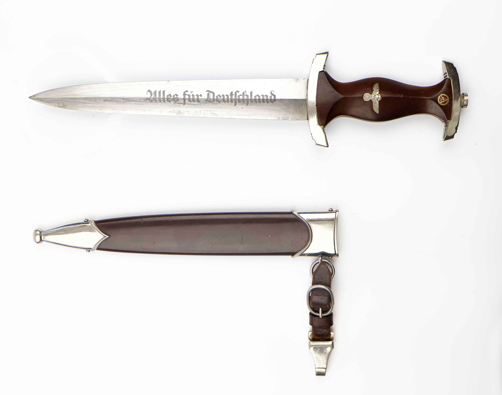 SA DAGGER: Fine S.A. dagger with leather hanger and clip, 8.75 in blade, 13.75 overall, brown wood grip inset with S.A runes button of unblemished enamel, and an eagle and swastika device, both of which are perf