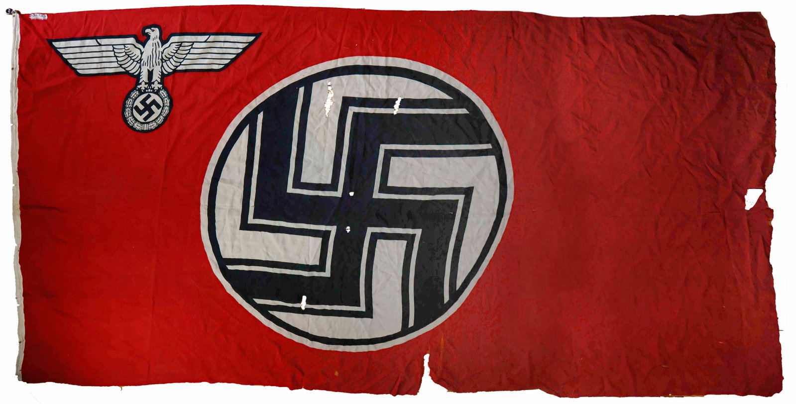 NSDAP STATE SERVICE FLAG: Flag, 37 X 134 in, single piece printed construction with swastika at the middle and German national eagle in the top corner, sewn-in rope hoist, with one metal loop at each end. Stains and a few tear