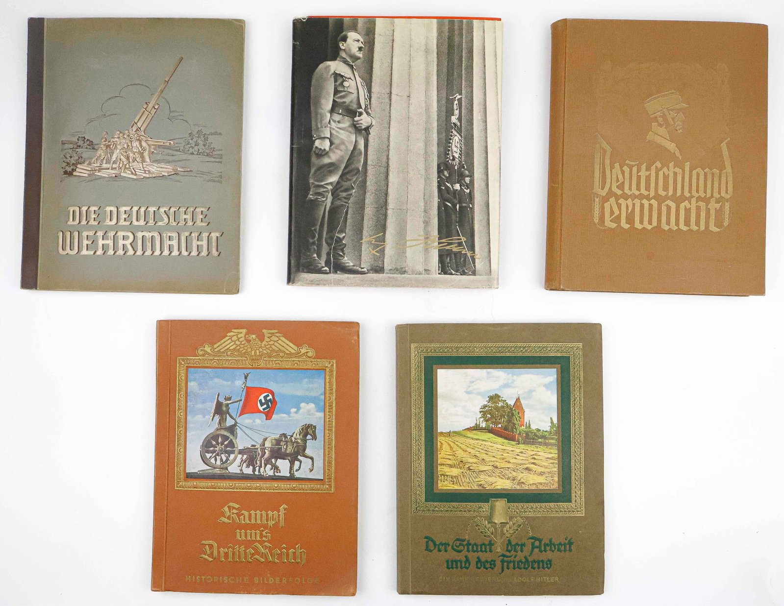 THIRD REICH ‘CIGARETTE’ BOOKS (5): A group of five German ‘cigarette’ albums, includes: ‘Lot of three German 'cigarette' books, includes: ‘Kampf uns Dritte Reich’, ‘Der Staat der Arbeit und des Fried