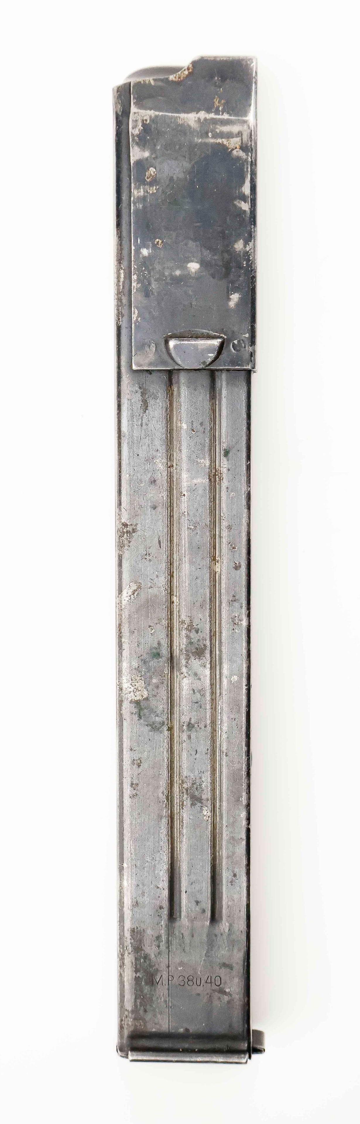 MP38/40 MACHINE GUN CLIP: World War II MP 38/40 machine gun clip, 9.5 in. long, of stamped blued steel construction. Marked at the top with two waffenamts, further marked ‘kur 42’.