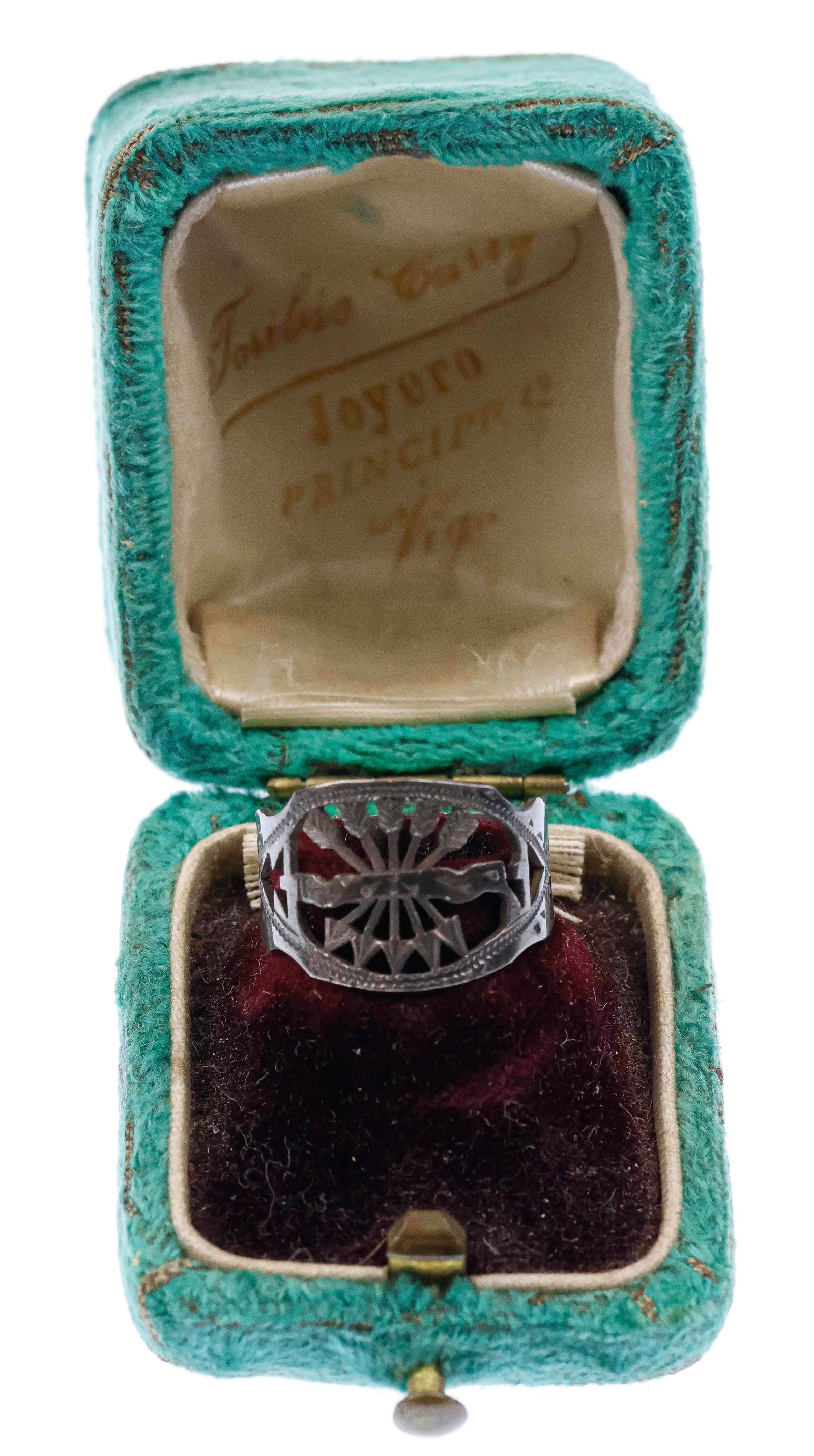 WOMEN’S FALANGIST PINKY RING: A dainty silver ring featuring a cut-out symbol of a yoke and arrows, representing the Falanga Espanola political party. It was founded in 1933 by Joseé Antoónio Primo de Rivera, the son of 