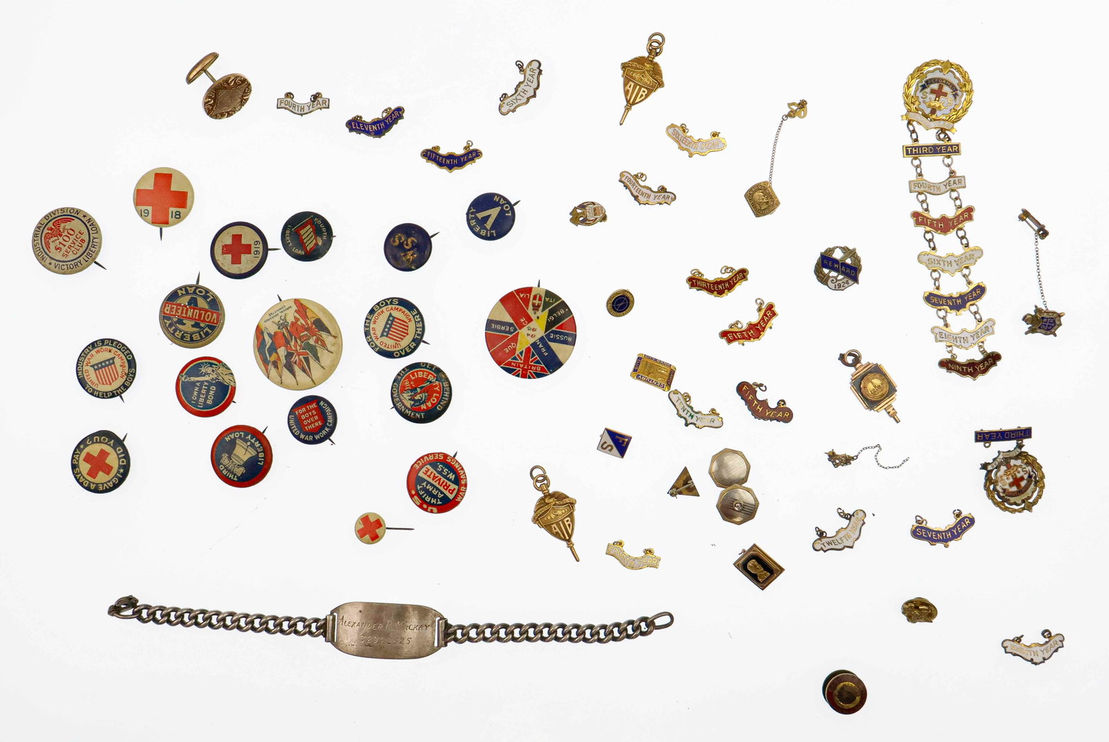 WORLD WAR II AMERICAN SOLDIER’S PERSONAL GROUPING: A nice grouping of several personal belongings of an American soldier of World War II, Alexander R. Mackay. Includes: his inscribed identification bracelet, bearing his name and number ‘32922525