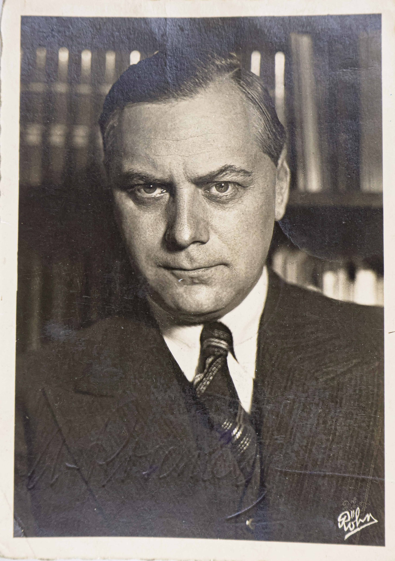 ALFRED ROSENBERG: (1893-1946) Nazi leader considered the ideologist of Nazism, Reichsminister of the eastern territories, executed at Nuremburg. S.P., 4 x 6 in. b/w, a Rohm real-photo postcard, deckle-edged, signed at 