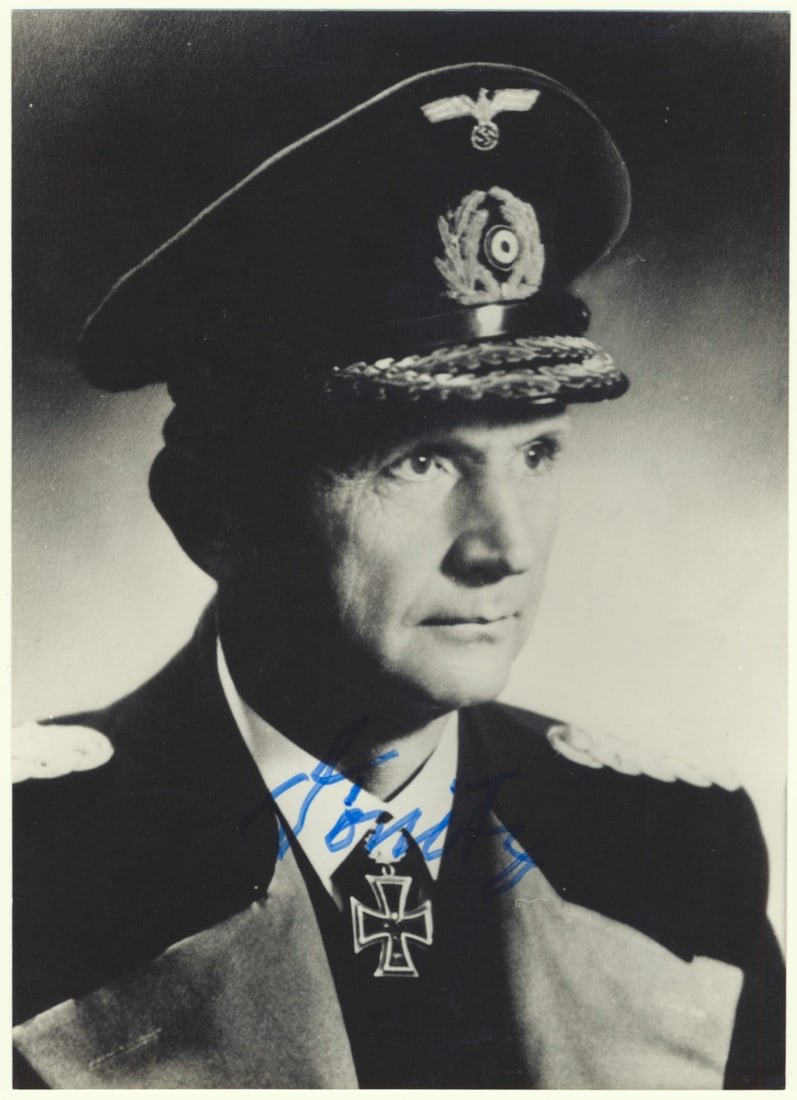 KARL DONITZ: (1891 - 1980) German admiral who headed the U-Boat arm of the German Navy, later succeeded Hitler as Fuhrer after Hitler's suicide. S.P., 4.25 x 5.5 in. b/w, a reproduction photograph of a war-date po