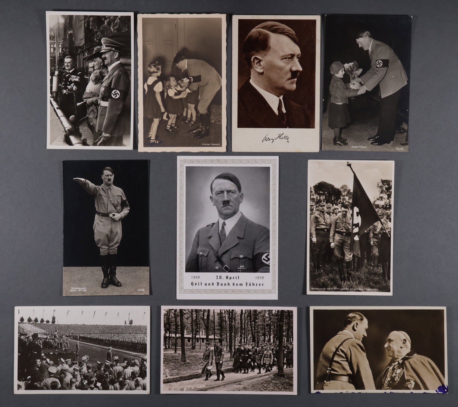 ADOLF HITLER POSTCARDS (10): Fine collection of ten postcards picturing Adolf Hitler in a variety of scenes. Fine.